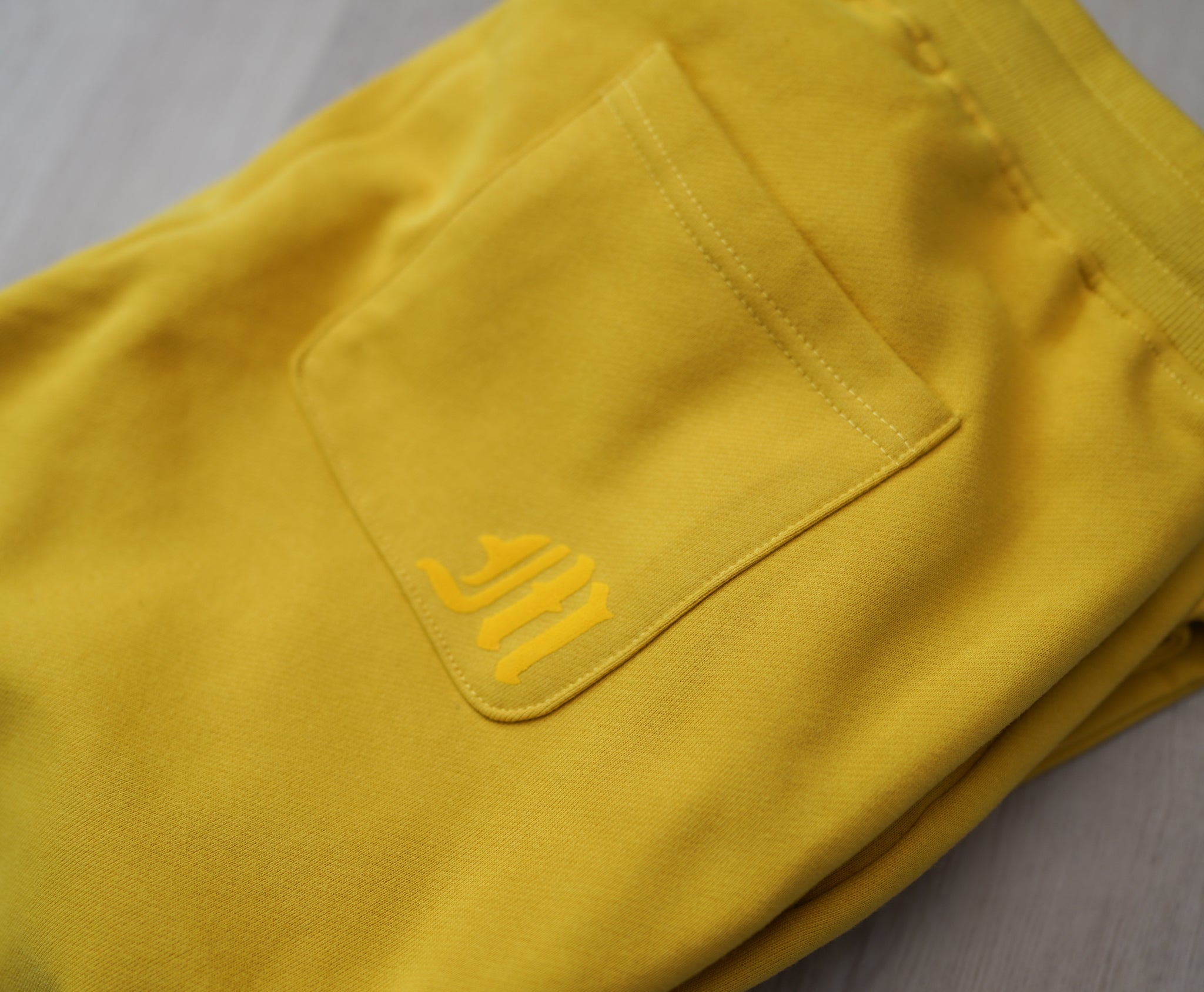 ARMOR FLARE PANT - GOLDEN YELLOW